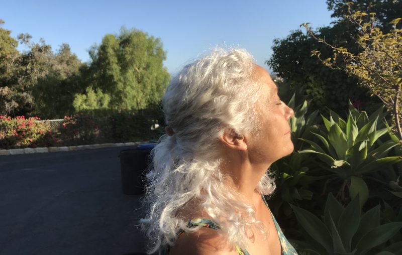 My profile with white hair in the sun